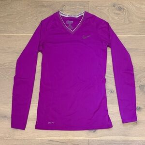 Nike Women’s Long Sleeve V-Neck Top in Bright Magenta